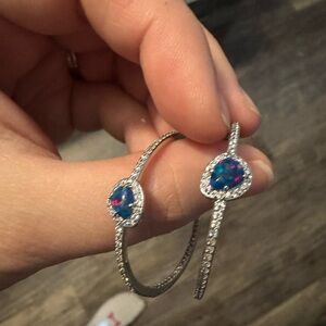 BP Silver Earrings with Blue Accents